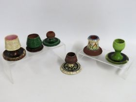 A collection of six match strikes & vesta holders