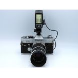 A Canon TL QL 35mm film camera with Canon FL 50mm
