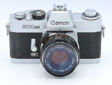 A Canon EX Auto QL 35mm film camera with Canon EX
