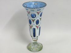 A 19thC. Bohemian white on blue overlay glass vase