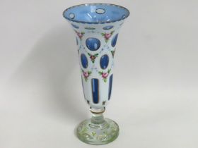 A 19thC. Bohemian white on blue overlay glass vase