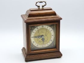 A walnut cased brass & silvered dial Biggs of Maid