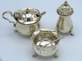 A matched three piece Sheffield silver condiment s