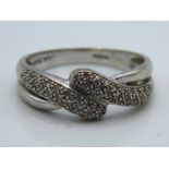 A 9ct white ring set with 0.25ct of diamond, 2.9g,