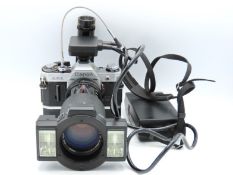 A Canon AE-1 35mm film camera with a Canon Zoom FD