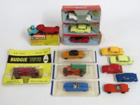 Three boxed Minix diecast models, one Tuf-Tots box