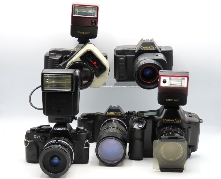 Five Canon 35mm film cameras: T50 & manual with Se