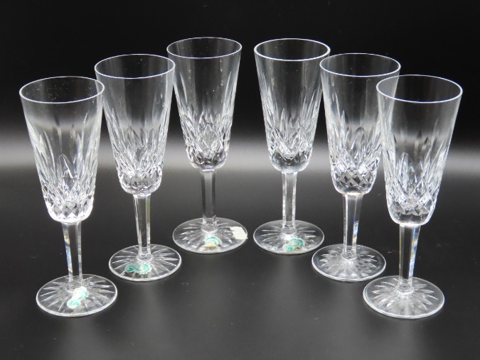 A set of six Waterford crystal champagne flutes, 1