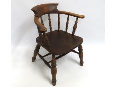 An antique elm smokers bow chair, 785mm high to ba