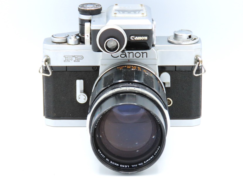 A Canon FP 35mm film camera with manual along with