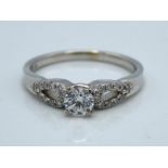 A 9ct white ring set with 0.31ct diamond, 2.5g, si