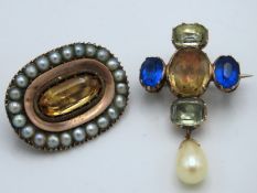 Two early 19thC. brooches, one with yellow metal c