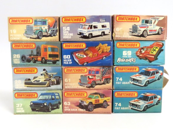 Twelve boxed Matchbox diecast models including Rol