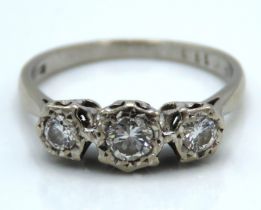 An 18ct white gold diamond trilogy ring of approx. 0.35ct, 2.9g, size M/N