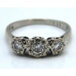 An 18ct white gold diamond trilogy ring of approx. 0.35ct, 2.9g, size M/N