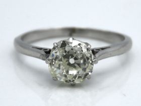 An early 20thC. platinum solitaire ring set with a