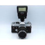 A Canon FTb QL 35mm film camera with a Canon FD 13