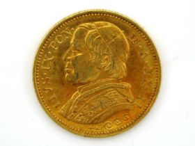 An 1868 gold Italian 20 Lire, approx. 22ct