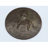 A bronze WMF plaque inscribed Creuze pixit, signed