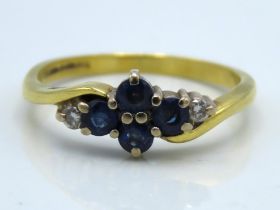 An 18ct gold diamond & sapphire ring, 3.2g, size O