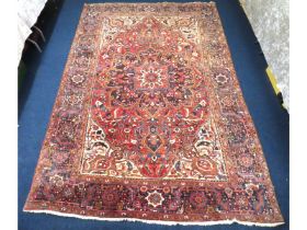 A large woollen Persian Tabriz style carpet, 3420m
