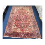 A large woollen Persian Tabriz style carpet, 3420m