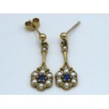A pair of 9ct gold drop earrings set with pearl &