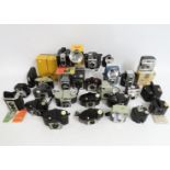 Twenty five mostly Kodak Brownie cameras including