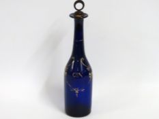 A 19thC. Bristol blue gilded gin decanter, 300mm t