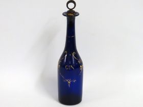 A 19thC. Bristol blue gilded gin decanter, 300mm t