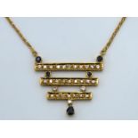 An 18ct gold geometric necklace & pendant set with