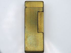 A vintage Dunhill hobnail 'Rollagas' lighter