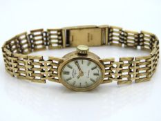 A ladies 9ct gold case & strap Rotary 21 jewel wri