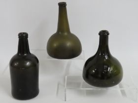 Two onion glass bottles twinned with a wine bottle