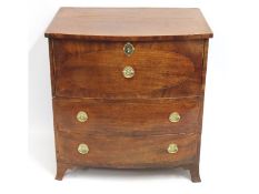 A low level Regency period mahogany commode with single top drawer & two faux drawers with brass fit