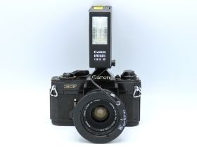 A Canon EF 35mm film camera with Canon FD 35mm len
