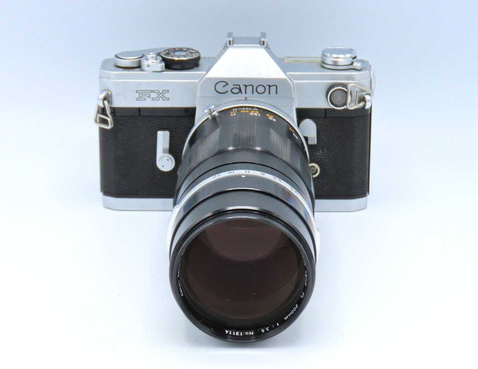 A Canon FX 35mm film camera with Canon FL 200mm le