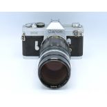 A Canon FX 35mm film camera with Canon FL 200mm le