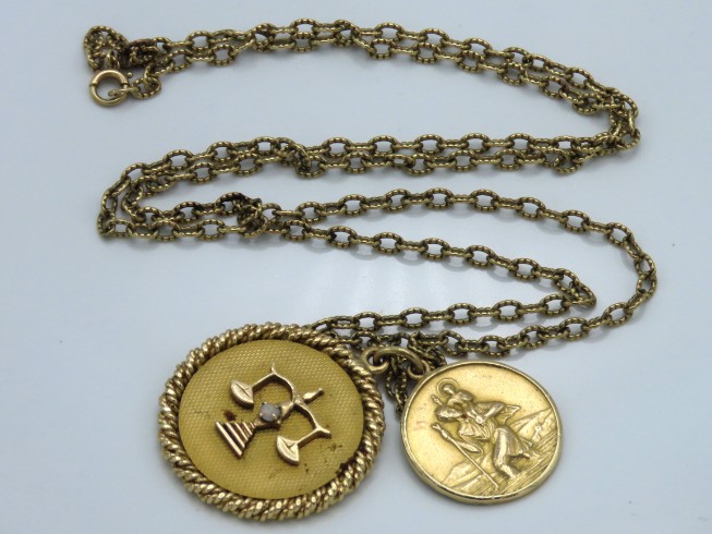 A 9ct gold chain 750mm long, & 9ct gold pendants,