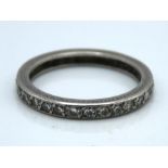 A platinum eternity ring set with approx. 1ct diam