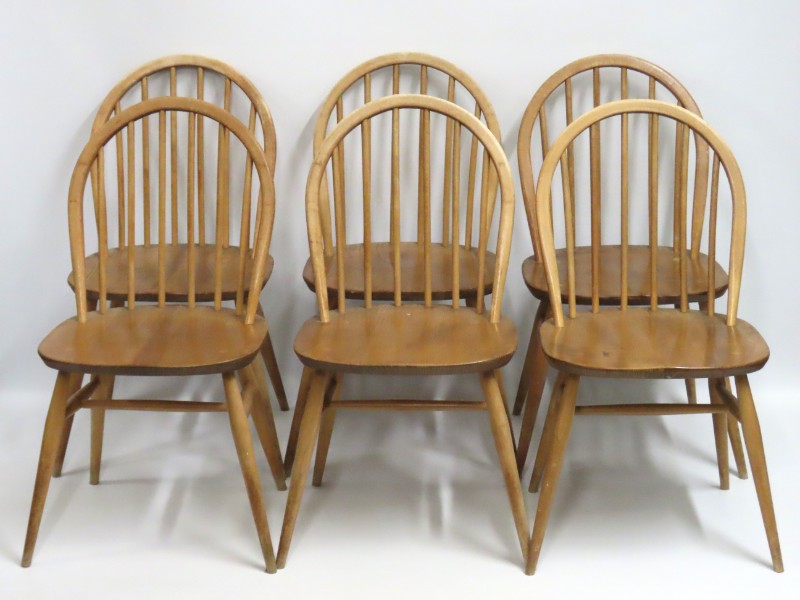 A set of six 1960's Ercol elm dining chairs, 810mm