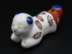 A 19thC. Japanese porcelain whistle with enamelled