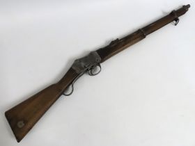 A Martini-Enfield rifle marked V. R. B.S.A & M. Co