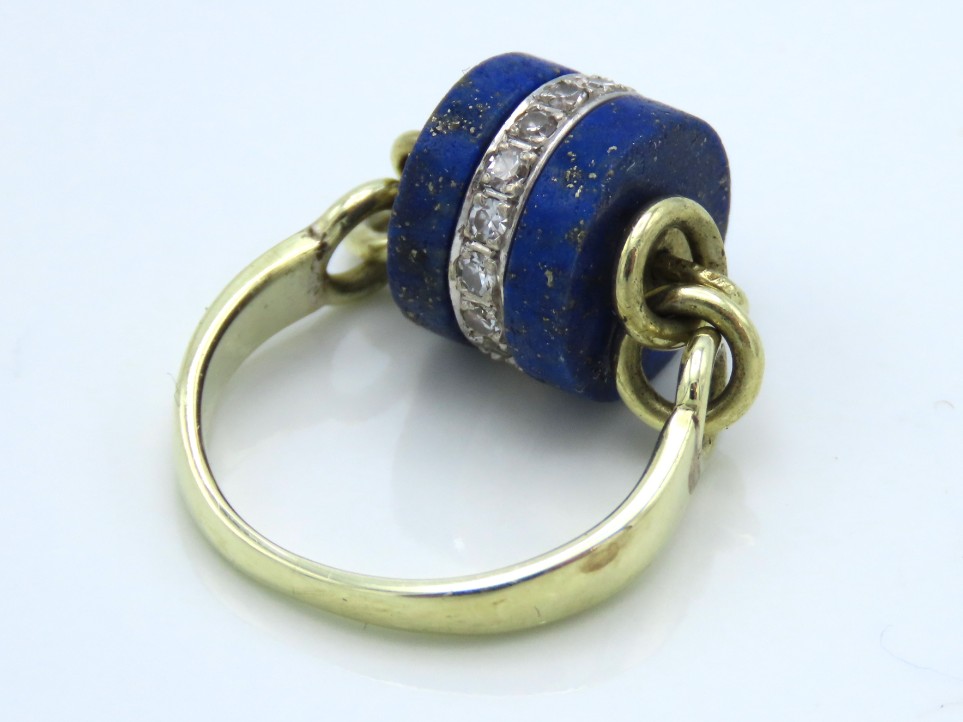 A 14ct gold scarf ring set with lapis lazuli & dia