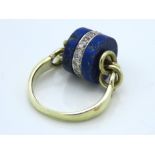 A 14ct gold scarf ring set with lapis lazuli & dia