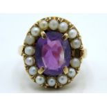 A 9ct gold ring set with amethyst & pearl, lacking