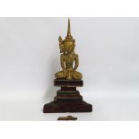 An antiquated Tibetan gilded & jewelled carved woo