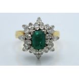 A 14ct gold art deco ring set with emerald, possib