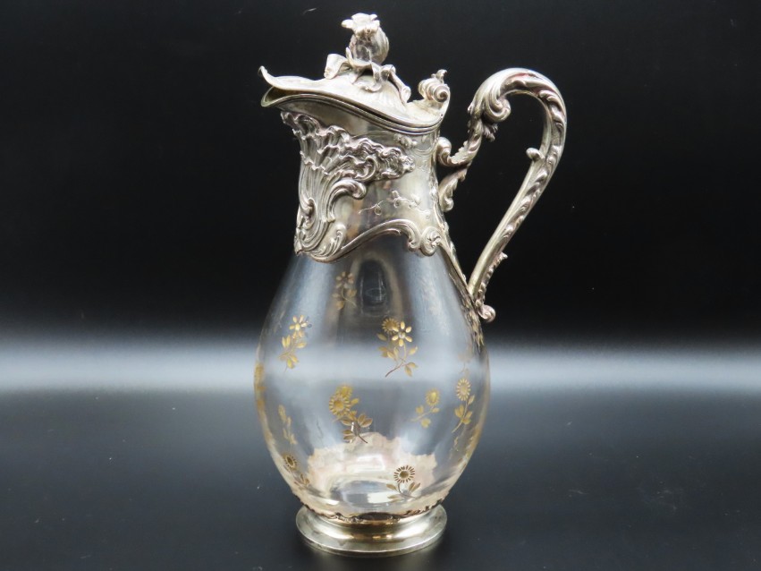 A 19thC. continental claret jug set with ornate wh