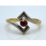 A two colour metal ring set with ruby, 4mm diamete